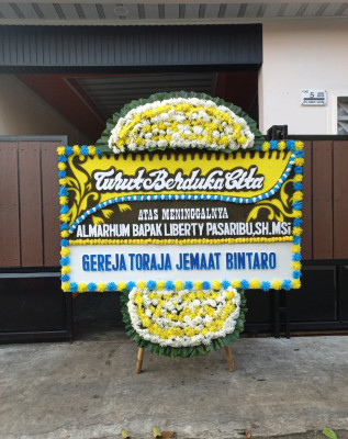 Papan Bunga Duka di Maitara